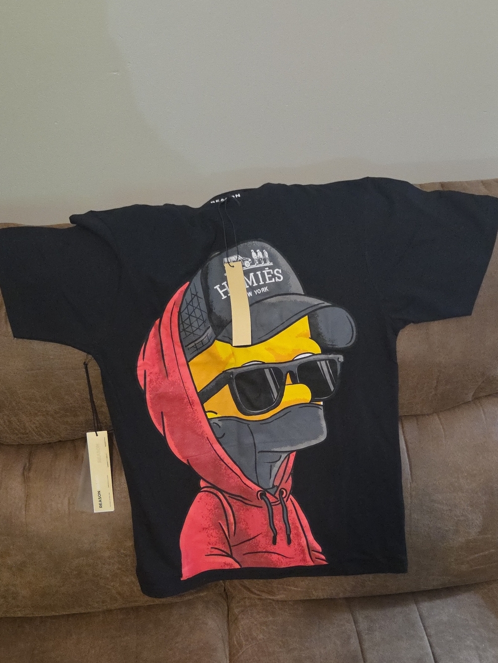 Reason Black Tee with Red Hoodie and Yellow Face Graphic